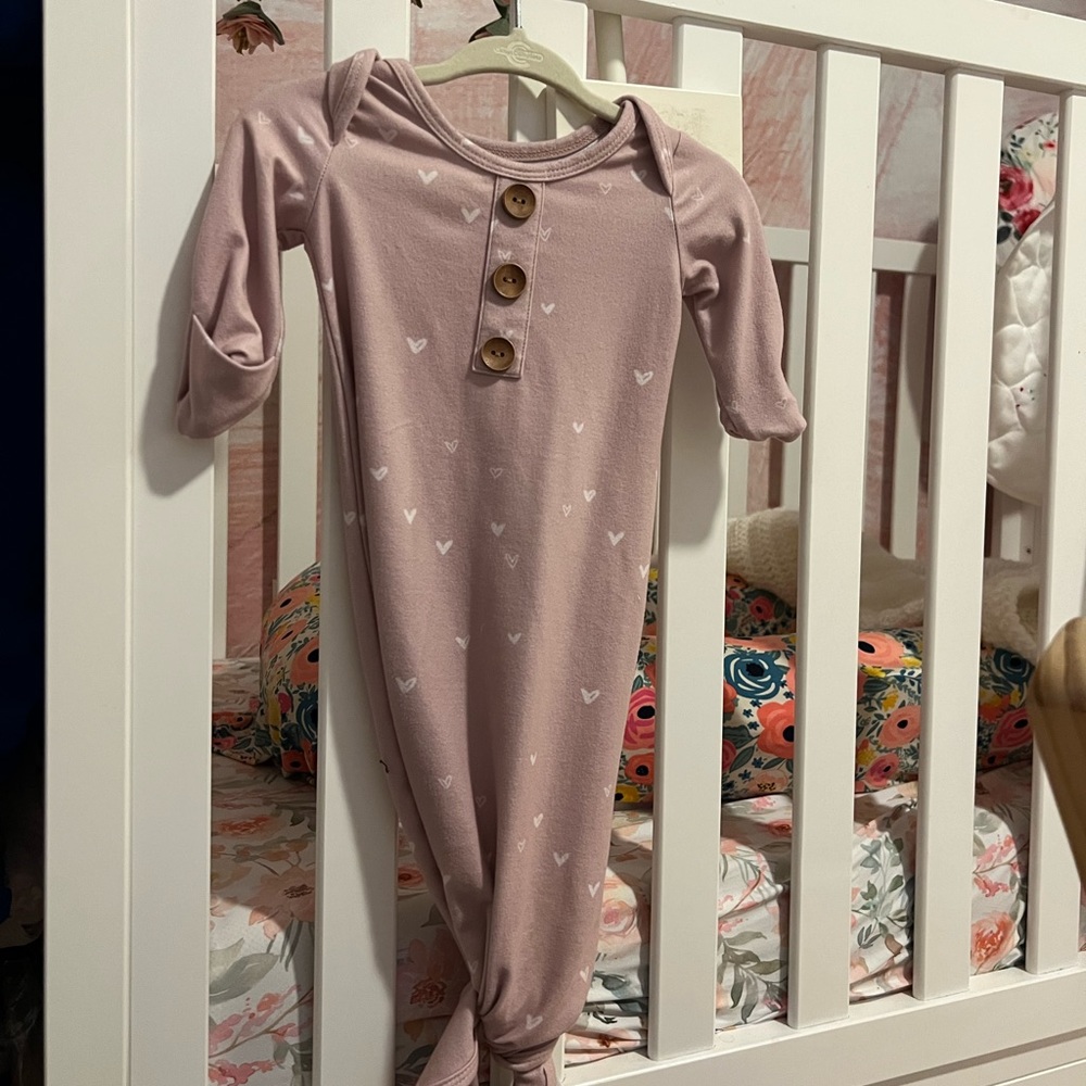 Like new. Baby wore it once but she was born in the summer